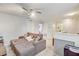 Loft with couch and access to other rooms at 15521 Long Cypress Dr, Ruskin, FL 33573