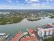 Wide aerial view of waterfront property, highlighting subject condo at 19201 Vista Ln # C8, Indian Shores, FL 33785