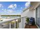 Balcony with seating and water views at 19201 Vista Ln # C8, Indian Shores, FL 33785