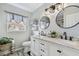 Elegant bathroom with double vanity and marble at 19201 Vista Ln # C8, Indian Shores, FL 33785