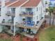 Two-story building with multiple balconies at 19201 Vista Ln # C8, Indian Shores, FL 33785