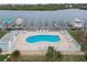 Community pool area with waterfront views and dockage at 19201 Vista Ln # C8, Indian Shores, FL 33785