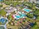 Community overview featuring pool, clubhouse, and tennis courts at 20000 Outpost Pt Dr, Tampa, FL 33647