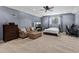 Spacious bedroom with plush seating and a large window at 20000 Outpost Pt Dr, Tampa, FL 33647