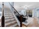 Modern staircase leading to an open living area at 20000 Outpost Pt Dr, Tampa, FL 33647