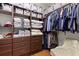 Large walk-in closet with ample shelving and hanging space at 20000 Outpost Pt Dr, Tampa, FL 33647