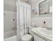 Bathroom with tub, shower, and vanity at 2311 Brisbane St # 1, Clearwater, FL 33763