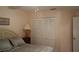 Bedroom with queen bed and built-in closet at 2320 Marksmen Ct # 205, Sun City Center, FL 33573
