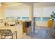 Sunroom with comfortable seating and large windows at 2320 Marksmen Ct # 205, Sun City Center, FL 33573