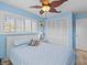 Bedroom with a queen-size bed and built-in closet at 240 Timberlane Dr, Palm Harbor, FL 34683