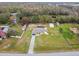 Aerial view of a single-Gathering home with a pool and large yard at 25555 Oaks Blvd, Land O Lakes, FL 34639