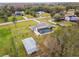 Aerial view showcasing a house with pool and large lot at 25555 Oaks Blvd, Land O Lakes, FL 34639