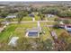 House with a pool and large backyard, aerial view at 25555 Oaks Blvd, Land O Lakes, FL 34639