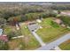 Aerial view of a single-Gathering home with a pool and large yard at 25555 Oaks Blvd, Land O Lakes, FL 34639