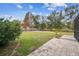 Landscaped backyard with patio and open space at 25555 Oaks Blvd, Land O Lakes, FL 34639