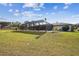 Large screened pool with spacious patio area at 25555 Oaks Blvd, Land O Lakes, FL 34639