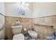 Clean bathroom with toilet, bidet, and handicap accessibility at 25555 Oaks Blvd, Land O Lakes, FL 34639