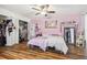 Bedroom with double bed and walk-in closet at 25555 Oaks Blvd, Land O Lakes, FL 34639