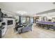 Open floor plan with living room, kitchen and breakfast bar at 25555 Oaks Blvd, Land O Lakes, FL 34639