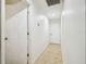 Hallway with doors to bedrooms and other areas at 25555 Oaks Blvd, Land O Lakes, FL 34639