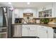 Modern kitchen with stainless steel appliances and granite countertops at 25555 Oaks Blvd, Land O Lakes, FL 34639