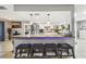 Granite countertop kitchen island with seating for four at 25555 Oaks Blvd, Land O Lakes, FL 34639