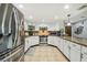 Modern kitchen with stainless steel appliances and granite countertops at 25555 Oaks Blvd, Land O Lakes, FL 34639