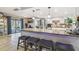 Open concept kitchen with breakfast bar and pool view at 25555 Oaks Blvd, Land O Lakes, FL 34639