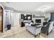 Spacious living room with fireplace and comfortable seating at 25555 Oaks Blvd, Land O Lakes, FL 34639