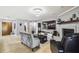 Cozy living room boasts a fireplace and comfortable seating at 25555 Oaks Blvd, Land O Lakes, FL 34639