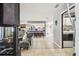 Open living room with view into kitchen and breakfast bar at 25555 Oaks Blvd, Land O Lakes, FL 34639