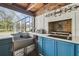 Outdoor kitchen features a built-in grill and sink at 25555 Oaks Blvd, Land O Lakes, FL 34639
