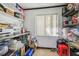 Well-stocked pantry with ample shelving for storage at 25555 Oaks Blvd, Land O Lakes, FL 34639