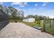 Spacious brick paver patio next to pool at 25555 Oaks Blvd, Land O Lakes, FL 34639