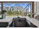 View of the pool from the outdoor kitchen area at 25555 Oaks Blvd, Land O Lakes, FL 34639
