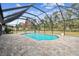 Inviting screened pool and patio area at 25555 Oaks Blvd, Land O Lakes, FL 34639