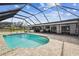 Relaxing screened pool and patio with brick pavers at 25555 Oaks Blvd, Land O Lakes, FL 34639