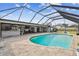 Screened pool and patio with outdoor kitchen at 25555 Oaks Blvd, Land O Lakes, FL 34639