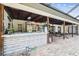 Outdoor kitchen and bar with a pool view at 25555 Oaks Blvd, Land O Lakes, FL 34639