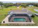 Enclosed pool area with a spacious screened enclosure at 25555 Oaks Blvd, Land O Lakes, FL 34639