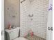 Shower with white subway tile at 25555 Oaks Blvd, Land O Lakes, FL 34639