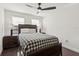 Bright bedroom with wood flooring and a ceiling fan at 29857 Southwell Ln, Wesley Chapel, FL 33543