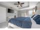 Bright bedroom featuring a comfortable bed and plenty of storage at 3204 Herne Bay Ct, Land O Lakes, FL 34638