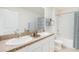 Double vanity bathroom with a shower/tub combo at 3475 Hilltop Cir, Lakewood Ranch, FL 34211