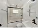 Modern bathroom with walk-in shower and vanity at 3946 Doral Dr, Tampa, FL 33634