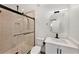 Modern bathroom featuring a walk-in shower and floating vanity at 3946 Doral Dr, Tampa, FL 33634