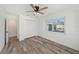 Bedroom with pool view and double closets at 3946 Doral Dr, Tampa, FL 33634