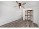 Spacious bedroom with walk-in closet and wood-look floors at 3946 Doral Dr, Tampa, FL 33634
