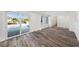 Bright Gathering room with sliding doors leading to the pool and canal at 3946 Doral Dr, Tampa, FL 33634