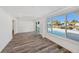 Bright Gathering room with large windows overlooking the pool and canal at 3946 Doral Dr, Tampa, FL 33634